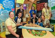 22 June 2017; Young Zach King, third right, age 6, from Ballincollig, Co. Cork is joined by, from left, play specialist Caro O'Connor, Laois footballer Colm Begley, assistant director of nursing Fiona Brennan, director of the Childhood Cancer Foundation Mary Claire Rennick, mother Sinead King, and play specialist Áine Ní Fhaoláin, during the GPA and Childhood Cancer Foundation #Championsofcourage launch at Our Lady's Children's Hospital, in Crumlin, Dublin. Photo by Seb Daly/Sportsfile
