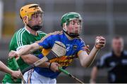 22 June 2017; Brian McGrath of Tipperary is tackled by Tom Morrissey of Limerick during the Bord Gais Energy Munster GAA Under 21 Hurling Quarter-Final match between Limerick and Tipperary at the Gaelic Grounds in Limerick. Photo by Ramsey Cardy/Sportsfile