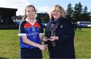 12 March 2017; Mairead Daly, WIT, is presented with the player of the match by Marie Hickey, President, LGFA, after the Lynch Cup Final match between Waterford Institute of Technology and Dublin Institute of Technology at St Patrick's Park in Westport, Co. Mayo. Photo by Brendan Moran/Sportsfile