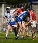 18 June 2017; Stephen Bennett of Waterford pulls the helmet of Damien Cahalane of Cork during the Munster GAA Hurling Senior Championship Semi-Final match between Waterford and Cork at Semple Stadium in Thurles, Co Tipperary.  Photo by Piaras Ó Mídheach/Sportsfile
