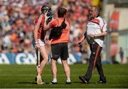 18 June 2017; Damien Cahalane of Cork is treated for an injury after an off the ball incident with Stephen Bennett of Waterford during the Munster GAA Hurling Senior Championship Semi-Final match between Waterford and Cork at Semple Stadium in Thurles, Co Tipperary.  Photo by Piaras Ó Mídheach/Sportsfile