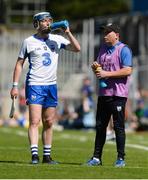 18 June 2017; Stephen Bennett of Waterford takes a drink from kitman Tommy Byrne during the Munster GAA Hurling Senior Championship Semi-Final match between Waterford and Cork at Semple Stadium in Thurles, Co Tipperary.  Photo by Piaras Ó Mídheach/Sportsfile
