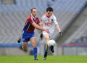 12 February 2012; Gareth Devlin, Derrytresk Fir an Chnoic, in action against Trevor Lydon, Naomh Pádraig, Clonbur. AIB GAA Football All-Ireland Junior Club Championship Final, Naomh Pádraig, Clonbur, Galway v Derrytresk Fir an Chnoic, Tyrone, Croke Park, Dublin. Picture credit: Pat Murphy / SPORTSFILE