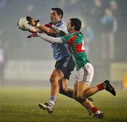 11 February 2012; Ross McConnell, Dublin, in action against Keith Higgins, Mayo. Allianz Football League, Division 1, Round 2, Mayo v Dublin, McHale Park, Castlebar, Co. Mayo. Picture credit: David Maher / SPORTSFILE