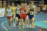 12 February 2012; Conor Bradley, 233, City of Derry, and Ruairi Finnegan, 66, Letterkenny A.C., Co. Donegal, lead the field during the Senior Men's 1500m at the Woodie’s DIY Senior Indoor Athletics Championships 2012. Odyssey Arena, Belfast, Co. Antrim. Photo by Sportsfile