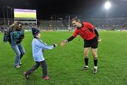 4 February 2012; Dara Brennan, age 10, from Clontarf, Dublin, brings out the match ball to referee Maurice Deegan before the game. Allianz Football League, Division 1, Round 1, Dublin v Kerry, Croke Park, Dublin. Picture credit: Brendan Moran / SPORTSFILE