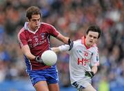 12 February 2012; Eamon O Cuiv, Naomh Pádraig, Clonbur, in action against Gareth Devlin, Derrytresk Fir an Chnoic. AIB GAA Football All-Ireland Junior Club Championship Final, Naomh Pádraig, Clonbur, Galway v Derrytresk Fir an Chnoic, Tyrone, Croke Park, Dublin. Picture credit: Pat Murphy / SPORTSFILE