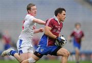 12 February 2012; Brian Keane, Naomh Pádraig, Clonbur, in action against Caolan Corr, Derrytresk Fir an Chnoic. AIB GAA Football All-Ireland Junior Club Championship Final, Naomh Pádraig, Clonbur, Galway v Derrytresk Fir an Chnoic, Tyrone, Croke Park, Dublin. Picture credit: Pat Murphy / SPORTSFILE