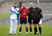 12 February 2012; Umpire Jimmy Galligan, left, with,  from left to right,referee Joe McQuillan, linesman Cormac Reilly and stand by referee Joe Curley. Allianz Football League, Division 2, Round 2, Monaghan v Kildare, St Tiernach's Park, Clones, Co Monaghan. Picture credit: Barry Cregg / SPORTSFILE