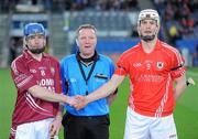 11 February 2012; Brian Phelan, St. Patrick's Ballyragget, left, and Danny O'Flynn, Charleville, right, shake hands in front of referee Eamon Hasson. AIB GAA Hurling All-Ireland Junior Club Championship Final, Charleville, Cork v St. Patrick's Ballyragget, Co. Kilkenny, Croke Park, Dublin. Picture credit: Pat Murphy / SPORTSFILE