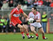 12 February 2012; Ronan McNabb, Tyrone, in action against Cailean O'Boyle, Derry. Allianz Football League, Division 2, Round 2, Tyrone v Derry, Healy Park, Omagh, Co Tyrone. Picture credit: Brian Lawless / SPORTSFILE