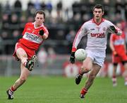 12 February 2012; Brian McCallion, Derry, in action against Damian McCaul, Tyrone. Allianz Football League, Division 2, Round 2, Tyrone v Derry, Healy Park, Omagh, Co Tyrone. Picture credit: Brian Lawless / SPORTSFILE