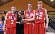 9 February 2012; Louise O'Loughlin, Basketball Ireland Schools Officer, presents co-captains, from left, Mark Rohan, Padraig Doran, and Peter Cooke, St. Josephs “Bish”, Galway, with the cup. All-Ireland Schools Cup U16A Boys Final, St. Josephs “Bish”, Galway v Douglas Community School, Cork, National Basketball Arena, Tallaght, Dublin. Picture credit: Brian Lawless / SPORTSFILE