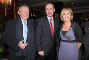 14 February 2012; In attendance at the launch of the Tayto Longford Arms Comótas Peile Páidi O’Sé 2012 are Tom Parlon, left, Fianna Fáil leader and T.D. for Cork South Central, Micheál  Martin, and Liz O'Donnell. The invitational GAA tournament, which will take place from 24-26 February 2012 across the Dingle Peninsula, will see 26 senior, intermediate and junior GAA club teams competing from 15 counties and greater London area.  This year, the men's senior cup will be renamed in memory of former Defence Forces Chief of Staff Dermot Earley. For full details check out www.paidiose.com. Launch of the Tayto Longford Arms Comótas Peile Páidi O’Sé 2012, D4 Berkeley Hotel, Dublin. Photo by Sportsfile
