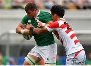 24 June 2017; Sean Reidy of Ireland holds off the tackle of Yoshitaka Tokanuga of Japan on the way to scoring his side's fifth try during the international rugby match between Japan and Ireland in the Ajinomoto Stadium in Tokyo, Japan. Photo by Brendan Moran/Sportsfile