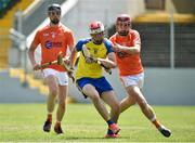24 June 2017; Andrew Flood of Roscommon in action against Kane Laverty and Oisin Keenan of Armagh during the Bank of Ireland Celtic Challenge Corn Michael Feery Final match between Armagh and Roscommon at Netwatch Cullen Park in Carlow. Photo by Seb Daly/Sportsfile