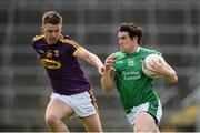 24 June 2017; Ger Collins of Limerick in action against Naomhan Rossiter of Wexford during the GAA Football All-Ireland Senior Championship Round 1B match between Limerick and Wexford at the Gaelic Grounds in Limerick. Photo by Diarmuid Greene/Sportsfile
