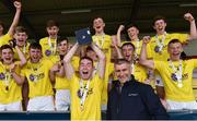 24 June 2017; Antrim captain Ryan McGarry lifts the trophy alongside former Tipperary All-Ireland winning manager Liam Sheedy after the Bank of Ireland Celtic Challenge Corn John Scott Final match between Antrim and North Cork at Netwatch Cullen Park in Carlow. Photo by Matt Browne/Sportsfile