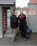 24 June 2017; Down manager Éamonn Burns is greeted at the gate by Ulster GAA official Mark Neilson ahead of the Ulster GAA Football Senior Championship Semi-Final match between Down and Monaghan at the Athletic Grounds in Armagh. Photo by Daire Brennan/Sportsfile