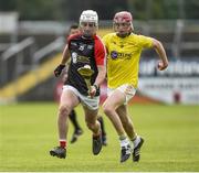 24 June 2017; Jake Madigan of Nort Cork in action against Niall McCormack of Antrim during the Bank of Ireland Celtic Challenge Corn John Scott Final match between Antrim and North Cork at Netwatch Cullen Park in Carlow. Photo by Matt Browne/Sportsfile