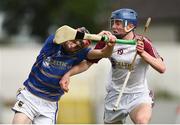 24 June 2017; Mark Downey of South Tipperary in action against Eoin O'Donnell of Galway Maroon during the Bank of Ireland Celtic Challenge Corn Michael Hogan Final match between Galway Maroon and South Tipperary at Netwatch Cullen Park in Carlow. Photo by Seb Daly/Sportsfile