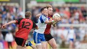 24 June 2017; Conor McManus of Monaghan in action against Shay Millar, left, and Gearard McGovern of Down during the Ulster GAA Football Senior Championship Semi-Final match between Down and Monaghan at the Athletic Grounds in Armagh. Photo by Daire Brennan/Sportsfile