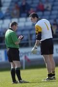 1 April 2007; Referee Eugene Murtagh takes note of Crossmaglen Rangers goalkeeper Paul Hearty's name. AIB All-Ireland Club Football Championship Final Replay, Dr Crokes v Crossmaglen Rangers, O'Moore Park, Portlaoise, Co. Laois. Picture credit: Brian Lawless / SPORTSFILE