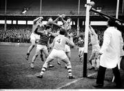 21 February 1965; A general view of the action between Ulster and Munster under the posts. Railway Cup Football Semi-Final, Ulster v Munster, Croke Park, Dublin. Picture credit; Connolly Collection / SPORTSFILE