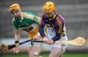 29 January 2012; Mark Fanning, Wexford, in action against Colin Egan, Offaly. Bord Na Mona Walsh Shield Semi Final, Wexford v Offaly, Wexford Park, Wexford. Picture credit: Matt Browne / SPORTSFILE