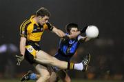 16 February 2012; Craig Berrigan, NUI Maynooth, in action against Mark Coughlan, UCD. Irish Daily Mail Sigerson Cup Quarter-Final, National University of Ireland, Maynooth v University College Dublin, NUIM, Maynooth, Co. Kildare. Picture credit: Stephen McCarthy / SPORTSFILE