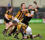 18 February 2012; Keith McMahon, Dr. Crokes, in action against Johnny Hanratty and James Morgan, Crossmaglen Rangers. AIB GAA Football All-Ireland Senior Club Championship Semi-Final, Dr. Crokes, Kerry v Crossmaglen Rangers, Armagh, O'Moore Park, Portlaoise, Co. Laois. Picture credit: Oliver McVeigh / SPORTSFILE