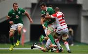 24 June 2017; James Ryan of Ireland is tackled by Luke Thompson and Michael Leitch of Japan during the international rugby match between Japan and Ireland in the Ajinomoto Stadium in Tokyo, Japan. Photo by Brendan Moran/Sportsfile