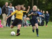 25 June 2017; Abbie Clarke of  Metropolitan Girls League in action against Sarah Geraghty of Inishowen Youth League  during the Fota Island Resort FAI Gaynor Cup at the University of Limerick in Limerick. Photo by David Maher/Sportsfile