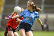 25 June 2017; Aoife Kennedy of Westport, Co. Mayo in action against Emma Comiskey of Killygarry, Co. Cavan during the Girls Division 1 Shield Final at the John West Peile na nÓg national competition which took place this weekend across Cavan, Fermanagh and Monaghan. This is the second year that the Féile na nGael and Féile Peile na nÓg have been sponsored by John West, one of the world’s leading suppliers of fish. The competition gives up-and-coming GAA superstars the chance to participate and play in their respective Féile tournament, at a level which suits their age, skills and strengths.   Photo by Matt Browne/Sportsfile