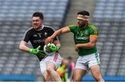 25 June 2017; Louth goalkeeper Robert Samson is tackled by Meath's Dean Maguire during the Leinster GAA Football Junior Championship Final match between Louth and Meath at Croke Park in Dublin. Photo by Ray McManus/Sportsfile