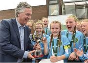 25 June 2017; Galway and District League captain Saoire Healey is presented with the U.14 Final Cup from FAI Chief Executive John Delaney after victory against Sligo Leitrim Schoolboys and girls League during the Fota Island Resort FAI Gaynor Cup at the University of Limerick in Limerick. Photo by David Maher/Sportsfile