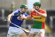 25 June 2017; Sean Downey of Laois is tackled by David English of Carlow during the GAA Hurling All-Ireland Senior Championship Preliminary Round match between Laois and Carlow at O'Moore Park in Portlaoise, Co. Laois. Photo by Ramsey Cardy/Sportsfile