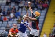 25 June 2017; Brian Tracey of Carlow in action against Neil Foyle of Laois during the GAA Hurling All-Ireland Senior Championship Preliminary Round match between Laois and Carlow at O'Moore Park in Portlaoise, Co. Laois. Photo by Ramsey Cardy/Sportsfile