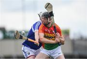 25 June 2017; Richard Kelly of Carlow is tackled by Neil Foyle of Laois during the GAA Hurling All-Ireland Senior Championship Preliminary Round match between Laois and Carlow at O'Moore Park in Portlaoise, Co. Laois. Photo by Ramsey Cardy/Sportsfile