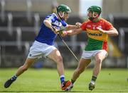 25 June 2017; Sean Downey of Laois is tackled by David English of Carlow during the GAA Hurling All-Ireland Senior Championship Preliminary Round match between Laois and Carlow at O'Moore Park in Portlaoise, Co. Laois. Photo by Ramsey Cardy/Sportsfile