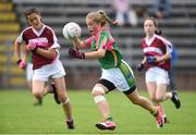 25 June 2017; Saoirse Desmond of Glanmire GAA Club, Co. Cork in action against Castlerahan-Denn GAA Club, Co. Cavan during the Girls Division 1 Final at the John West Peile na nÓg national competition which took place this weekend across Cavan, Fermanagh and Monaghan. This is the second year that the Féile na nGael and Féile Peile na nÓg have been sponsored by John West, one of the world’s leading suppliers of fish. The competition gives up-and-coming GAA superstars the chance to participate and play in their respective Féile tournament, at a level which suits their age, skills and strengths.   Photo by Matt Browne/Sportsfile