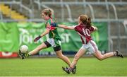 25 June 2017; Olivia McAllen of Glanmire GAA Club, Co. Cork in action against Hannah Fitzsimons of Castlerahan-Denn GAA Club, Co. Cavan during the Girls Division 1 Final at the John West Peile na nÓg national competition which took place this weekend across Cavan, Fermanagh and Monaghan. This is the second year that the Féile na nGael and Féile Peile na nÓg have been sponsored by John West, one of the world’s leading suppliers of fish. The competition gives up-and-coming GAA superstars the chance to participate and play in their respective Féile tournament, at a level which suits their age, skills and strengths.   Photo by Matt Browne/Sportsfile