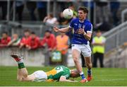 25 June 2017; Niall Clerkin of Cavan in action against Peter Cunningham of Offaly during the GAA Football All-Ireland Senior Championship Round 1B match between Offaly and Cavan at O'Connor Park in Tullamore, Co. Offaly. Photo by Ramsey Cardy/Sportsfile