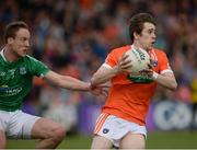 25 June 2017; Andrew Murnin of Armagh in action against Che Cullen of Fermanagh  during the GAA Football All-Ireland Senior Championship Round 1B match between Armagh and  Fermanagh at the Athletic Grounds in Armagh. Photo by Oliver McVeigh/Sportsfile