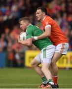 25 June 2017; Aidan Breen of Fermanagh in action against Brendan Donaghy of Armagh during the GAA Football All-Ireland Senior Championship Round 1B match between Armagh and  Fermanagh at the Athletic Grounds in Armagh. Photo by Philip Fitzpatrick/Sportsfile