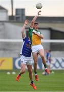 25 June 2017; Michael Brazil of Offaly in action against Ciaran Brady of Cavan during the GAA Football All-Ireland Senior Championship Round 1B match between Offaly and Cavan at O'Connor Park in Tullamore, Co. Offaly. Photo by Ramsey Cardy/Sportsfile