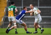 25 June 2017; Alan Mulhall of Offaly is tackled by Liam Buchanan of Cavan during the GAA Football All-Ireland Senior Championship Round 1B match between Offaly and Cavan at O'Connor Park in Tullamore, Co. Offaly. Photo by Ramsey Cardy/Sportsfile