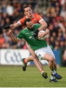 25 June 2017; Paul McCusker of Fermanagh in action against Aaron Mc Kay of Armagh during the GAA Football All-Ireland Senior Championship Round 1B match between Armagh and  Fermanagh at the Athletic Grounds in Armagh. Photo by Philip Fitzpatrick/Sportsfile