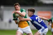 25 June 2017; Brian Darby of Offaly is tackled by Ryan Connolly of Cavan during the GAA Football All-Ireland Senior Championship Round 1B match between Offaly and Cavan at O'Connor Park in Tullamore, Co. Offaly. Photo by Ramsey Cardy/Sportsfile