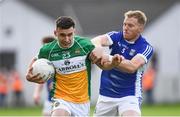25 June 2017; Sean Doyle of Offaly is tackled by James McEnroe of Cavan during the GAA Football All-Ireland Senior Championship Round 1B match between Offaly and Cavan at O'Connor Park in Tullamore, Co. Offaly. Photo by Ramsey Cardy/Sportsfile